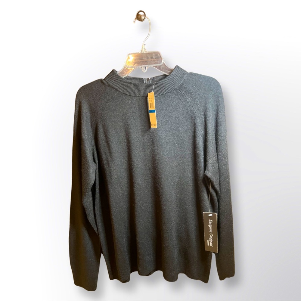 Black sweater by Deluxe Originals.